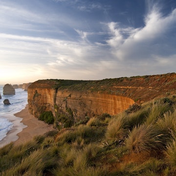 Twelve Apostles limestone stacks along rugged coastline.