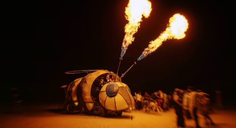 September 2, 2016: Flames shooting from a mutant vehicle at Burning Man in the evening.