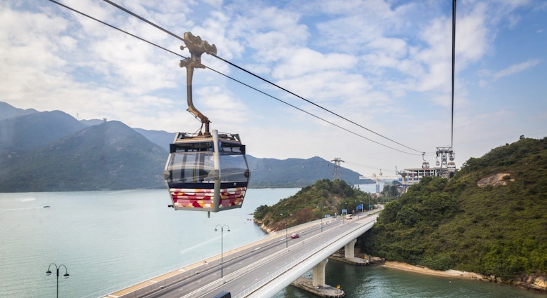High aerial view from above from cabin of cable car ride along ropeway heading towards Lamma Island - Hong Kong. Lamma Island (Chinese: å—丫島), also known as Y Island or Pok Liu Chau (åšå¯®æ´²) or simply Pok Liu (åšå¯®), is the third largest island in Hong Kong.
High aerial view from above from cabin of cable car ride along ropeway heading towards Lamma Island - Hong Kong. Lamma Island (Chinese: 南丫島), also known as Y Island or Pok Liu Chau (博寮洲) or simply Pok Liu (博寮), is the third largest island in Hong Kong.
1058347032