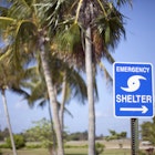 Hurricane shelter sign with Coconut Palm trees in the background on Little Cayman Island near the airport
111347853
vacation, travel, tropical destination, hurricane, remote