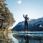 Junge Frau paddelt am SUP Board in der Morgensonne über den Eibsee, Blick zur Zugspitze, Garmisch-Partenkirchen, Bayern, Deutschland. * Young woman stand-up-paddling on Lake Eibsee in the morning light, overlooking the Zugspitze Mountain, Garmisch-Partenkirchen, Bavaria, Germany.
1308858076
RFC,  adults,  alps,  caucasian,  leisure,  millennials,  sunshine,  vacation,  woman,  zugspitze,  20-30 years,  stand up paddle surfing,  travel destination,  young adults,  Boat,  Canoe,  Canoeing,  Nature,  Oars,  Outdoors,  Paddle,  Person,  Photography,  Rowboat,  Vehicle,  Water,  Water Sports
Germany, Bavaria, Garmisch Partenkirchen, Young woman stand up paddling on Lake Eibsee