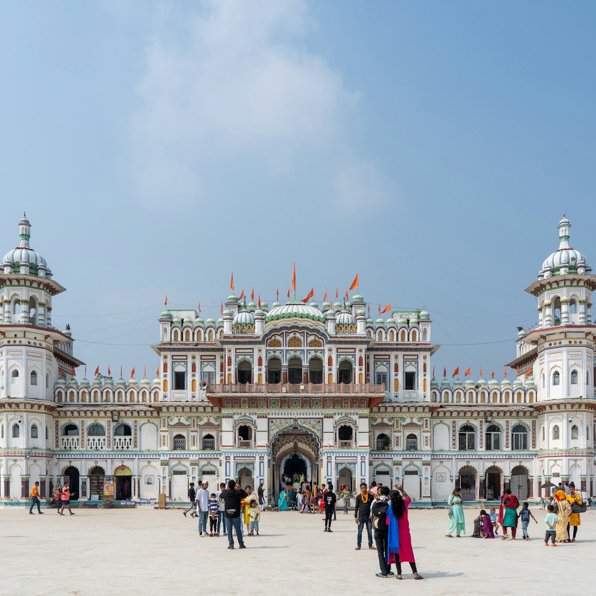 Pilgrims walking on the plaza of the Janaki Mandir in Janakpur, Nepal.