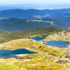 Aerial of Seven Rila Lakes in National Park Rila.
636105530
Travel, Tourism, Non-Urban Scene, Extreme Terrain, Number 7, Beauty In Nature, Rila Monastery, Landscaped, Stone Material, Hut, Beauty, Scenics, Discovery, Exploration, National Landmark, Famous Place, East, High Up, Nature, Urban Scene, Outdoors, Hiking, Bulgaria, Balkans, Europe, Summer, Rock - Object, Mountain Peak, Mountain Range, Mountain, Hill, Landscape, Pond, Lake, Water, Park - Man Made Space, Highland, Seven Rila Lakes, Bliznaka, SEVEN RILA LAKES, No People, Horizontal, Scenics - Nature, Landscape - Scenery, City, 60595, Public Park, Photography
