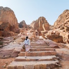 Female tourist at Petra famous archaeological site in Jordan's southwestern desert. Dating to around 300 B.C., it was the capital of the Nabatean Kingdom