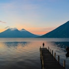 Observing the incredible beautiful sunrise at Lake Atitlan in Guatemala.  License Type: media  Download Time: 2022-03-29T09:35:18.000Z  User: AMccarthy_lonelyplanet  Is Editorial: No  purchase_order: