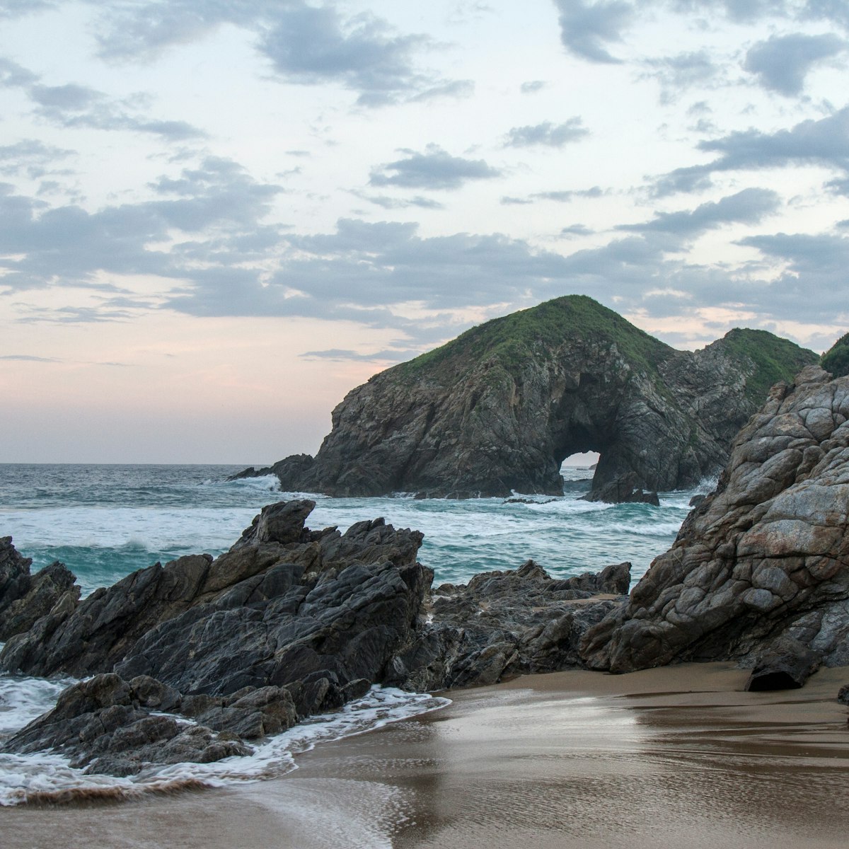 Sunset at the touristic Zipolite beach in Oaxaca, Mexico. Rocky beach with no people.; Shutterstock ID 2275510841; your: Sloane Tucker; gl: 65050; netsuite: Online Editorial; full: POI
2275510841