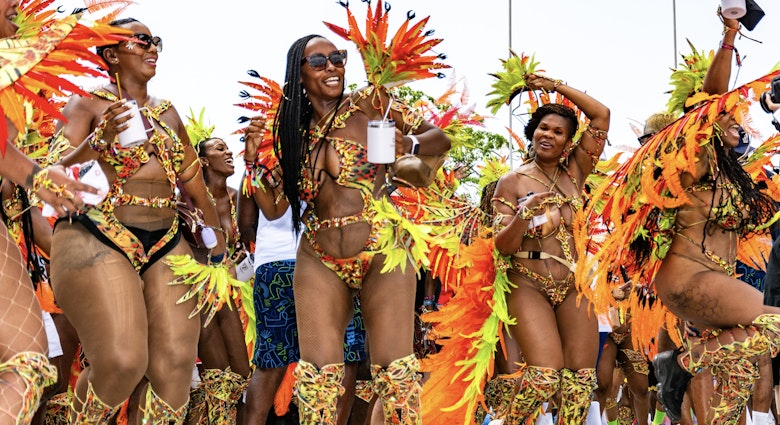 PORT OF SPAIN, TRINIDAD - February 13:  Masqueraders enjoy themselves in the Tribe Carnival presentation-Rainforest-, February 13, 2024 on the streets of Port of Spain, Trinidad.; Shutterstock ID 2425056851; purchase_order: 65050; job: Lonely Planet Online Editorial; client: First-time guide to Trinidad; other: Brian Healy
2425056851
art, attraction, bacchanal, beauty, body, bright, calypso, caribbean, carnival, carnivale, celebration, colorful, colour, costume, culture, dance, dancer, decoration, design, disguise, editorial, exotic, face, fantasy, fashion, feather, festival, fun, gay, glamour, happy, head shot, holiday, makeup, mardi gras, mas, masquerade, ornate, parade, party, port of spain, pretty, sexy, smile, soca, summer, tobago, trinidad, trinidad and tobago, trinidad carnival
PORT OF SPAIN, TRINIDAD - February 13: Masqueraders enjoy themselves in the Tribe Carnival presentation-Rainforest-, February 13, 2024 on the streets of Port of Spain, Trinidad