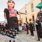 Oaxaca City, Oaxaca / Mexico - September 16th, 2018: Street parade in downtown Oaxaca celebrating Mexican Independence Day.; Shutterstock ID 1242657091; your: Brian Healy; gl: 65050; netsuite: Lonely Planet Online Editorial; full: Best neighborhoods in Oaxaca City