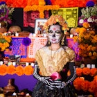 November 1, 2018: Girl in consume and face paint standing in front of an altar for the Day of the Dead festival.
1218974959
altar, art, beautiful, beauty, cancun, carnival, celebration, color, colorful, costume, cultural, cultural events, culture, day of the dead, decoration, dia de muertos, dress, editorial, event, face, face painting, festival, katrin, local, mask, mexican culture, mexican day of the dead, mexican tradition, mexico, national, parade, people, quintana roo, tradition, traditional, woman, young