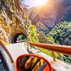 Car on road in Piva Canyon, National Park Montenegro and Bosnia and Herzegovina, Balkans, Europe. Beauty world.