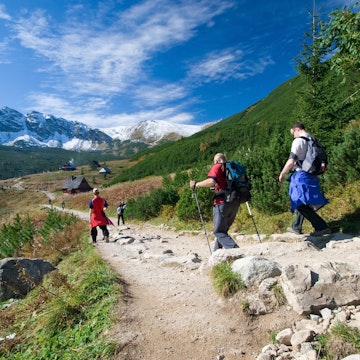 Group of people trekking in the Tatra Mountains.