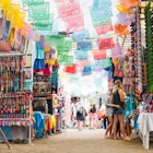 Mom And Kids Shopping In Mexico Street Market.