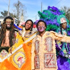 NEW ORLEANS, LOUISIANA - MARCH 05: (L-R) Lawrence Boudreaux, Marwan Pleasant, Jwan Boudreaux,  and Nigel Pleasant of the Golden Eagles Mardi Gras Indians face off with another tribe on March 5, 2019 in New Orleans, Louisiana. (Photo by Erika Goldring/Getty Images)