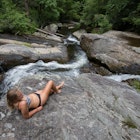 FW95WK Waterfall at Lake Jocassee during pontoon boat tour in Upstate South Carolina.